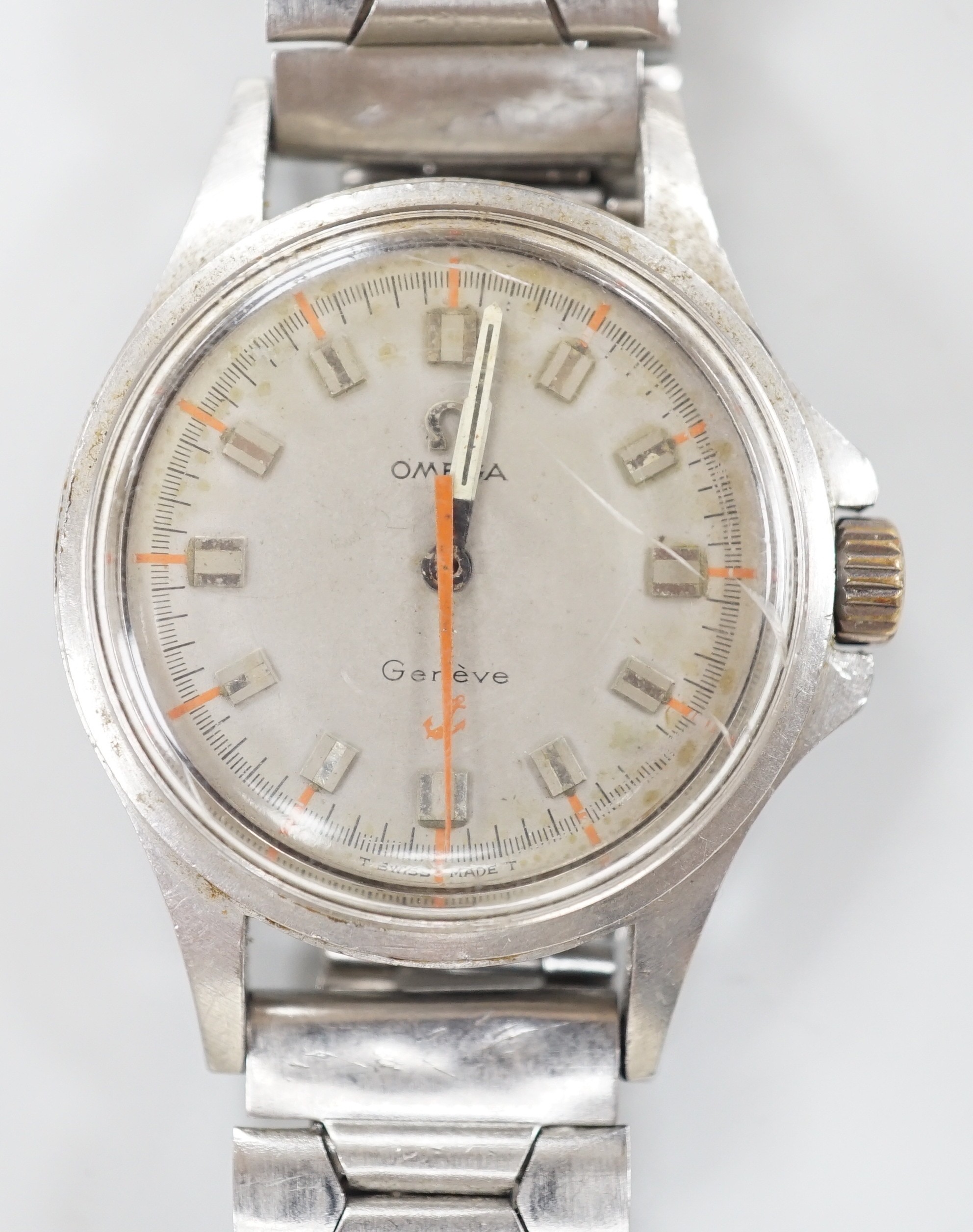 A gentleman's late 1960's stainless steel Omega manual wind wrist watch, movement c.601, case diameter 35mm, with orange sweep seconds, on associated steel bracelet.
